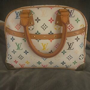 LV Multicolor
I bought her thrift shopping not sure if it's authentic or not.